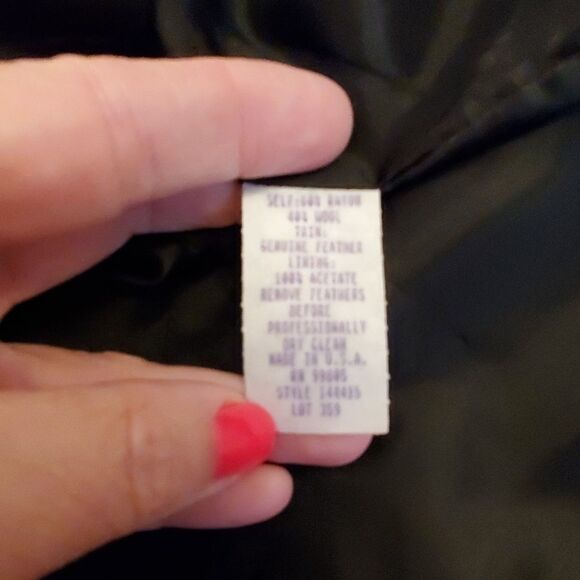 Fun black pencil skirt with feather lined bottom - Picture 3 of 7